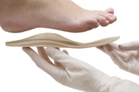 Custom Orthotics and Symptomatic Flexible Flatfoot